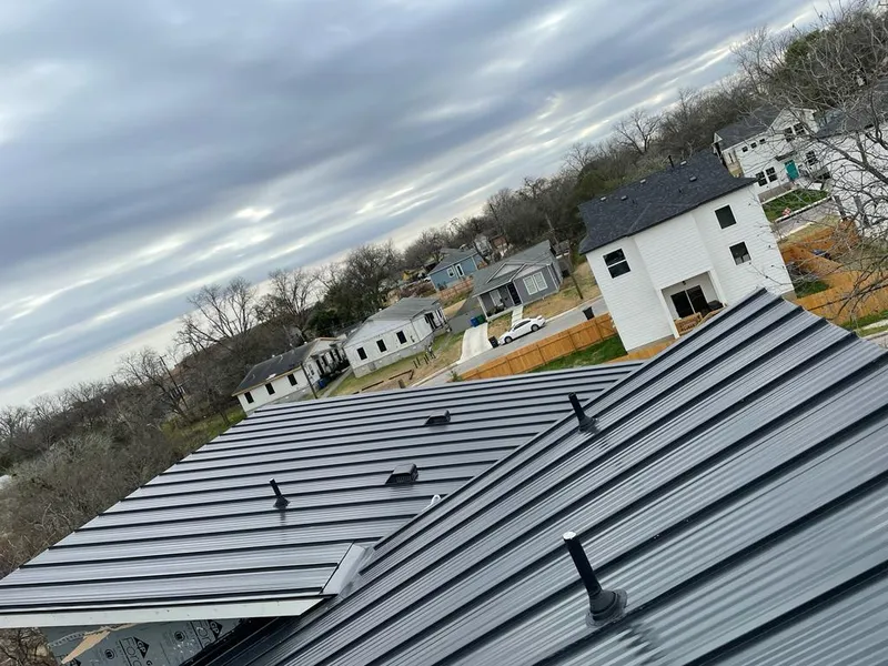 Standing seam metal roof panels with vents for Skylight Repair in Oroville